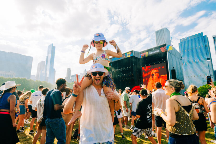 A parent and child at Lollapalooza